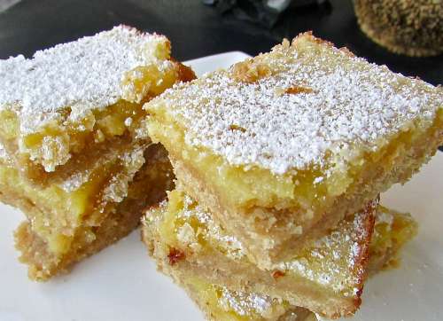 Lemon squares are good for travelin' and are a bake sale favorite! I like to serve them when tailgating but of course we've got 4 more months  before college football season cranks up...
